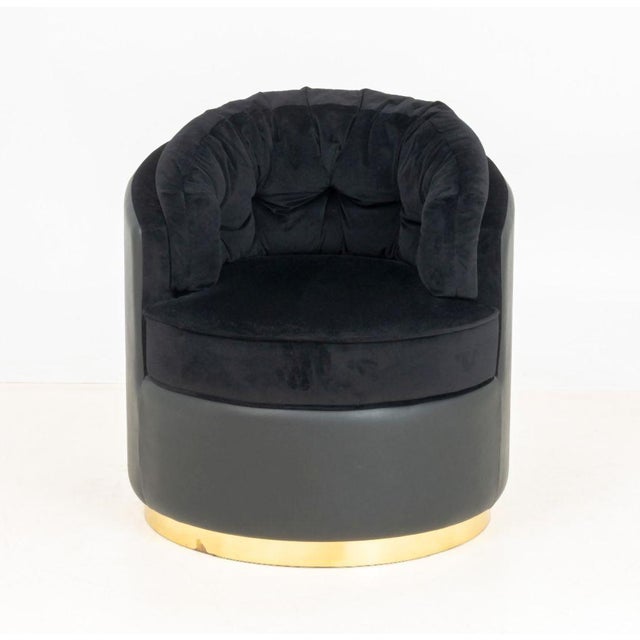 Luxxu "Otto" Black Velvet and Leather Arm Chair, with brass circular base. 30.5" H x 25" W x 31" D; seat: 17" H....