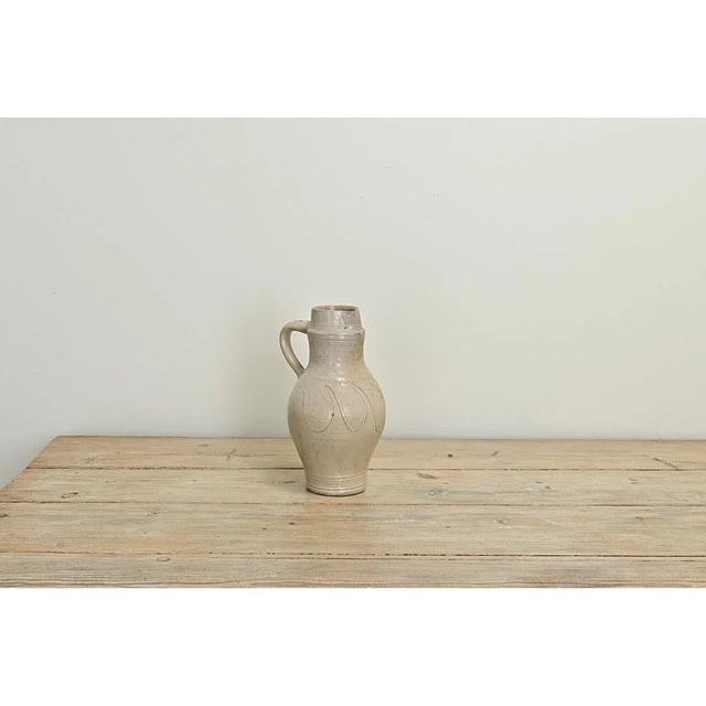 This French earthenware jar adds character to any interior with its unique texture, etched pattern, color, and patina. The...