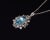 Top quality natural aquamarine and diamond pendant with a gorgeous filigree floral design. This finely crafted 18K solid...