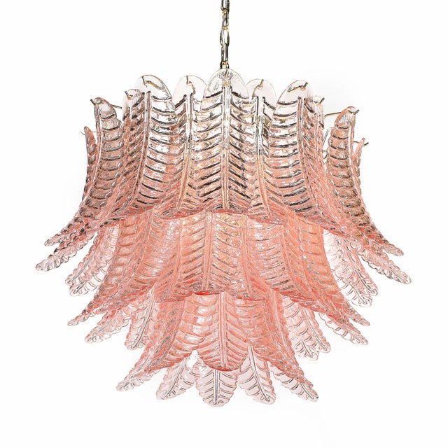 This modernist hand-blown Murano chandelier is a captivating example of Venetian craftsmanship, originating from Italy...