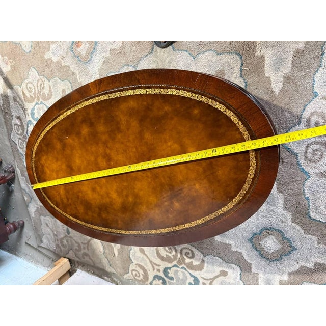 Vintage Regency Style Oval Leather Top Flame Mahogany Coffee Table on Casters. By Weiman. For Sale - Image 10 of 11