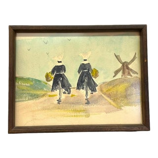 Vintage Watercolor Painting of Nuns on Bicycles With Windmill – Framed Mid-Century Whimsical Folk Art For Sale