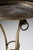 An elegant French bronze guéridon dating from around 1900, featuring a circular, slightly raised tray top with a...