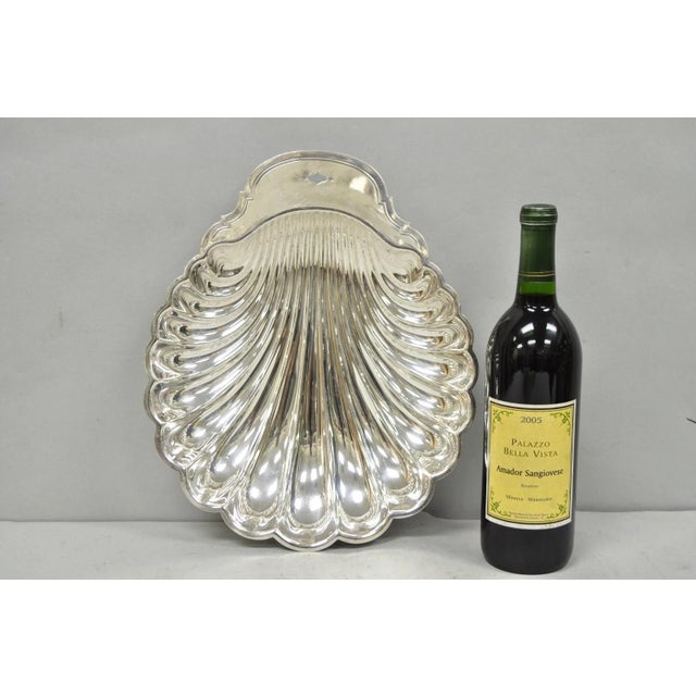 Vintage Mid Century Modern WM Rogers Silver Plated Clam Shell Serving Dish. Circa Mid 20th Century. Measurements: 2" H x...