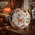 Antique 19th‑century Russian porcelain plate by the Gulin Brothers Factory, beautifully hand painted with a central bird...
