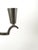 Rare and elegant pair of five-light candelabra produced by Svenskt Tenn in Sweden during the 1930s. These sculptural...