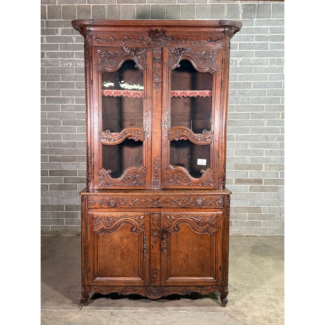 Mid 19th Century French Walnut China Buffet. Beautiful condition with incredible carving. Unique piece purchased in...