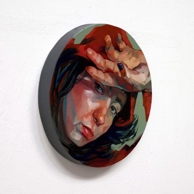 Captured Moment 3 features a close-up portrait of a figure, whose expression conveys a blend of introspection and...