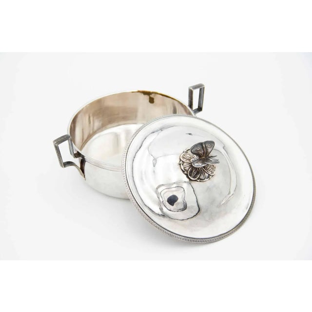 Silver Bowl with Butterfly-Shaped Handle, in Very Good conditions. Designed before 1890 This piece has an attribution...