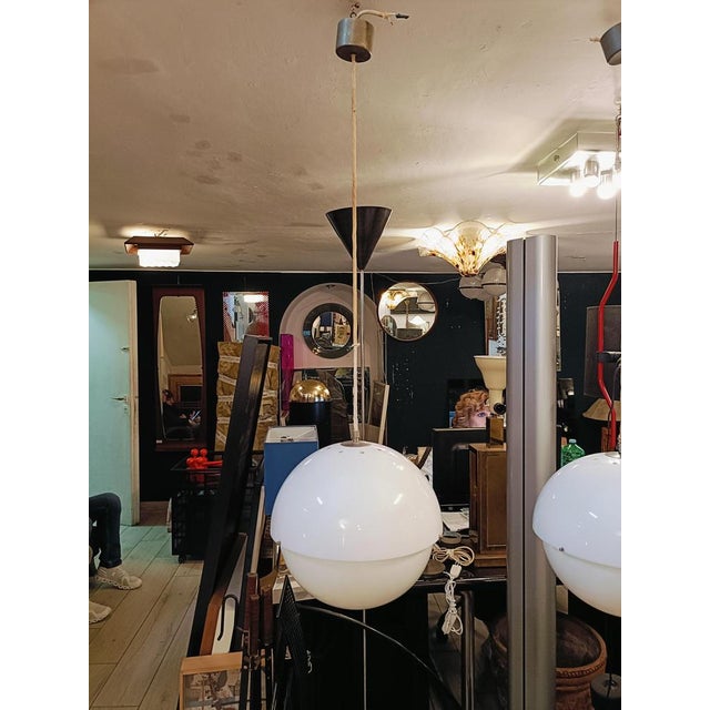 Suspension lamp mod.4022 designed by Archietto Luigi Bandini Buti for Kartell in the 1960s. This pendant lamp was...
