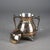 Four Piece Antique Silver Plated Footed Tea Set with Foliate Engraving C1890 Measures - 9"H x 7.75"W x 5.25"D (Largest)