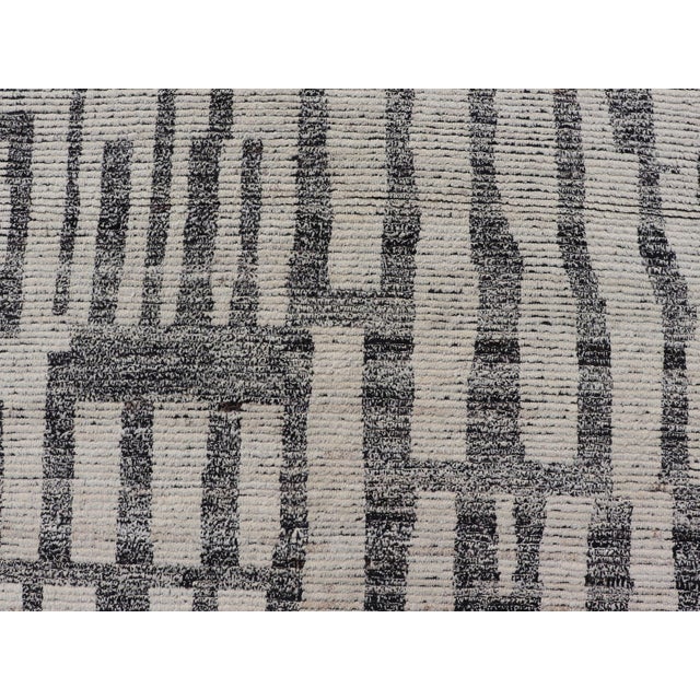 Measures: 13'4 x 14'4 The Striking Modern Moroccan Style Tribal Rug captures the essence of contemporary design while...
