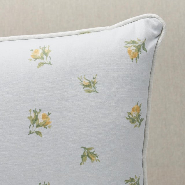 This pillow features Margie Floral. A classic delicate rosebud pattern inspired by a vintage design, Margie Floral is...