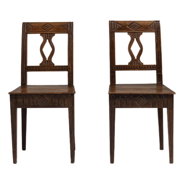 Pair of 19th Century French Chestnut Brown Carved Oak Chairs For Sale