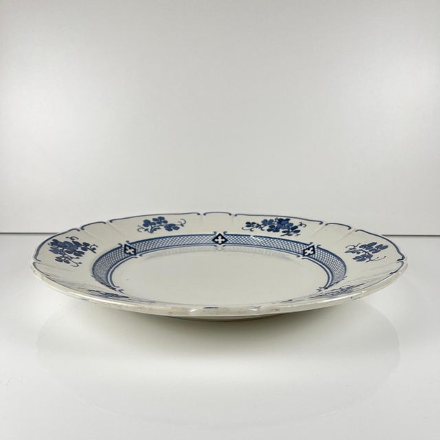 Large round Terre de Fer KG Lunéville platter, "Jane" pattern, blue, 1890-1915 Dimensions: Diameter: 34 cm Height: 4 cm...