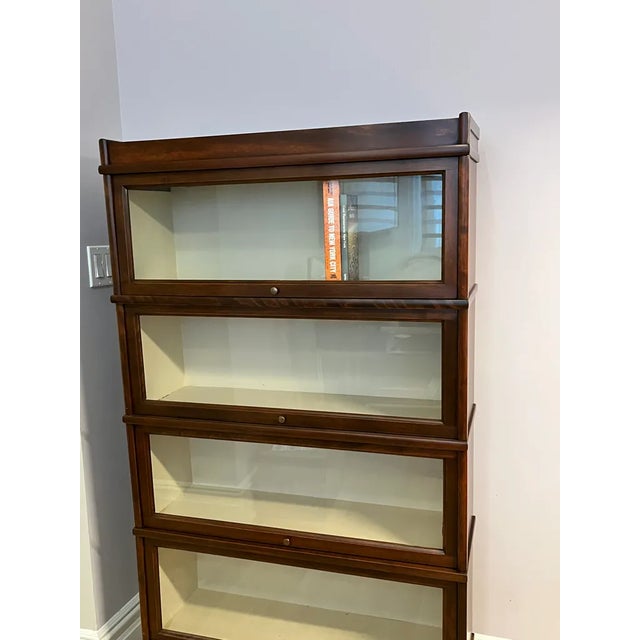 Gorgeous 4 piece sectional authentic barrister/legal bookcases with top and bottom stand. I had this piece completely...