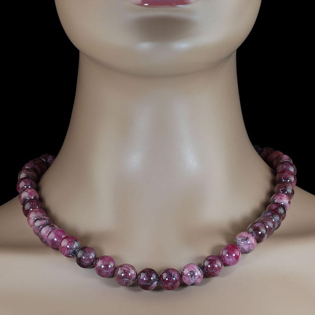 Elegant Raspberry Red Rhodonite Necklace – 23.5 Inches Make a sophisticated statement with this elegant raspberry red...
