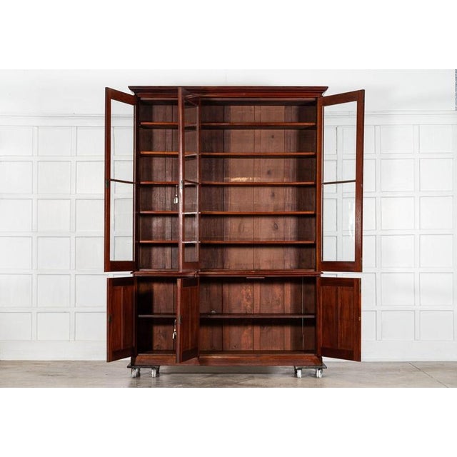 Circa 1870 large english 19thc mahogany glazed bookcase together w185 x d41.5 x h258 cm base w178 x d41.5 x h87 cm base...