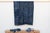 A masterwork of Malian textile heritage featuring deep indigo saturation and symbolic geometric motifs. Originating from...