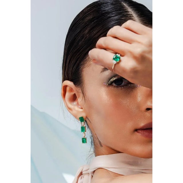 This is part of Chairish’s Fine Jewelry assortment. Octagon Cut Emerald Diamond Drop Earrings in 18K Gold to make a...
