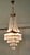 Large French Empire Style Crystal Waterfall Chandelier This is a large and Stunning piece, it has a gilt brass frame with...