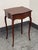 Design Plus Gallery presents a Vintage Edwardian Side Table. The mahogany table has a shaped rectangular top, serpentine...