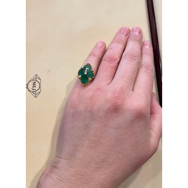 A classic, Cocktail ring 7.5 Carat Natural 4 Oval Cut Emerald & Diamond Flower Ring 18 Karat Yellow Gold Beautiful design...
