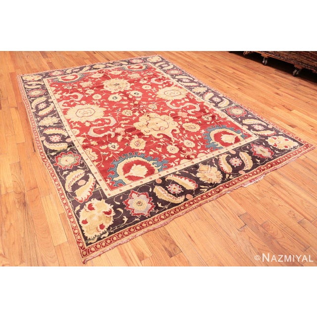 A Remarkably Youthful Rich Red Color Background Large Scale Design Vintage Indian Agra Area Rug, Country of Origin: India,...
