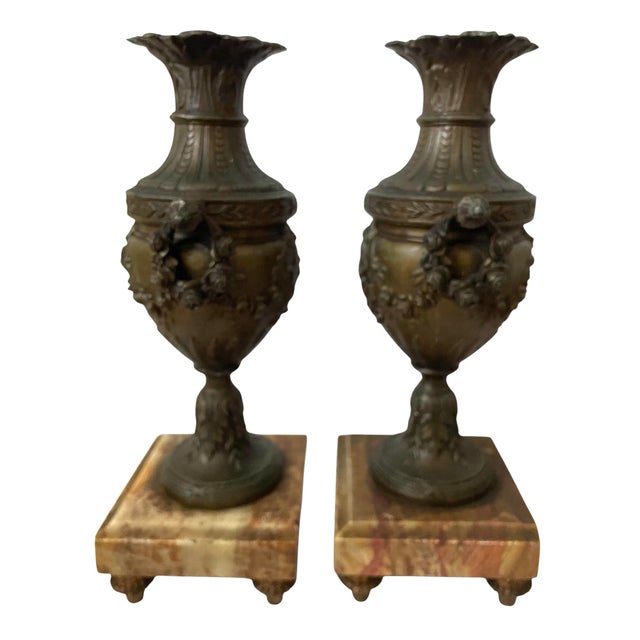 This product is a pair of antique French bronze urns Cassolettes with marble bases, dating back to around 1890. The urns...