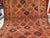 This rare antique hand-knotted wool area rug showcases a highly collectible Turkmen Yomut tribal design. The center field...