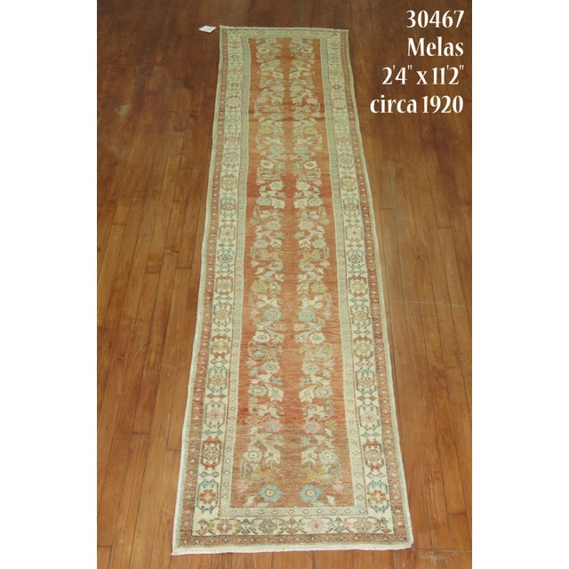 Early 20th century Turkish Runner with an-all over floral design on a peach field