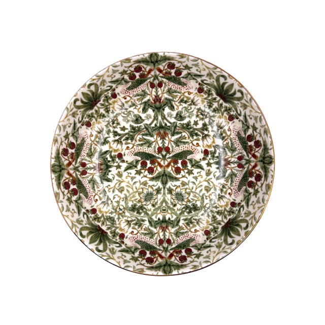 A beautifully coordinated set of four Morris & Co. “Strawberry Thief” soup bowls, crafted in premium porcelain. This...