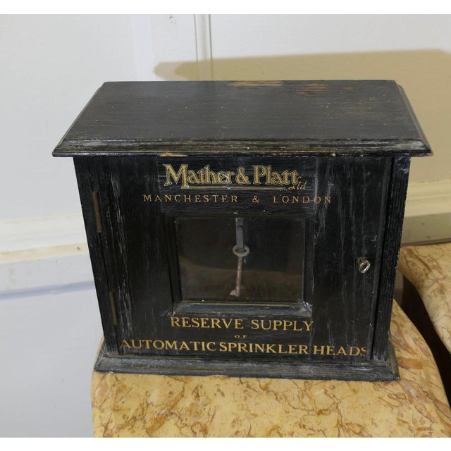 Set of Mather and Platt Sprinkler Heads in Case A rare find, still in their original cabinet, complete with Key and...