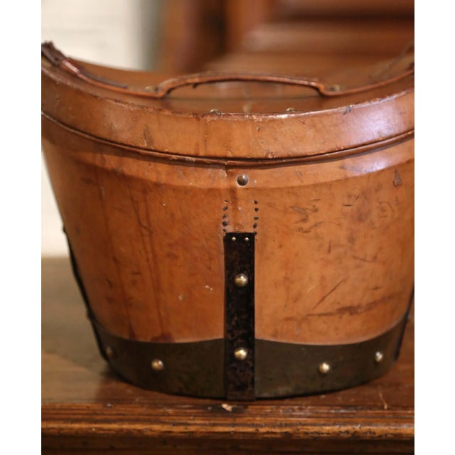 Add authentic French elegance to a dressing room, study, or entry with this antique leather hat box complete with its...