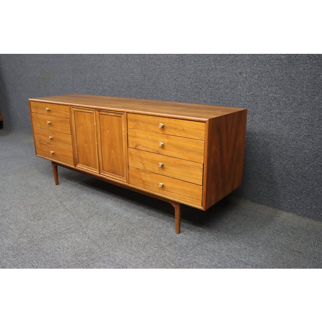Designed by Kipp Stewart and Stewart MacDougall for Drexel's highly regarded Declaration collection, this walnut credenza...