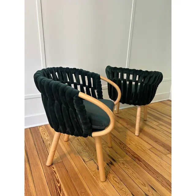 These chairs are believed to be by Kenneth Cobonpue based on design, materials, and construction. The pieces are unmarked...