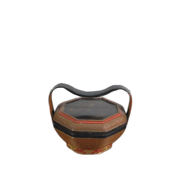 This mid 19th century bamboo basket from China is a fine example of expert craftsmanship. The basket is small, measuring...