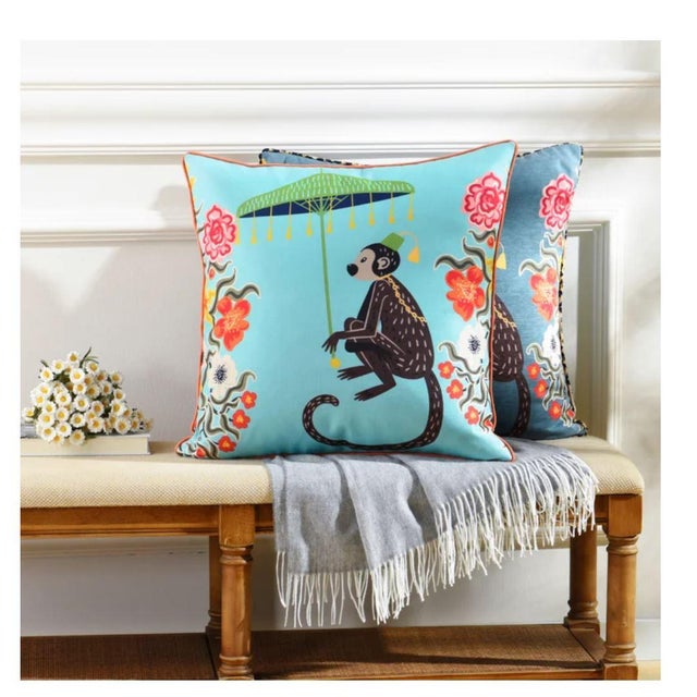 The Blue Monkey & Leopard 24" Square Down Pillow Add a wild touch of luxury to your space with this eye-catching double-...