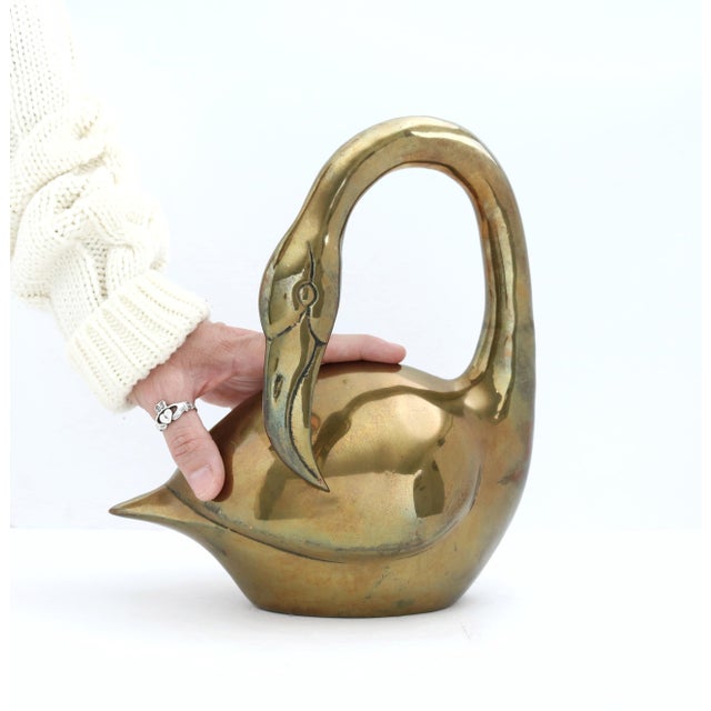 Vintage Brass Flamingo. This listing is for a beautiful brass bird: depicting a floating flamingo. Place this lovely piece...