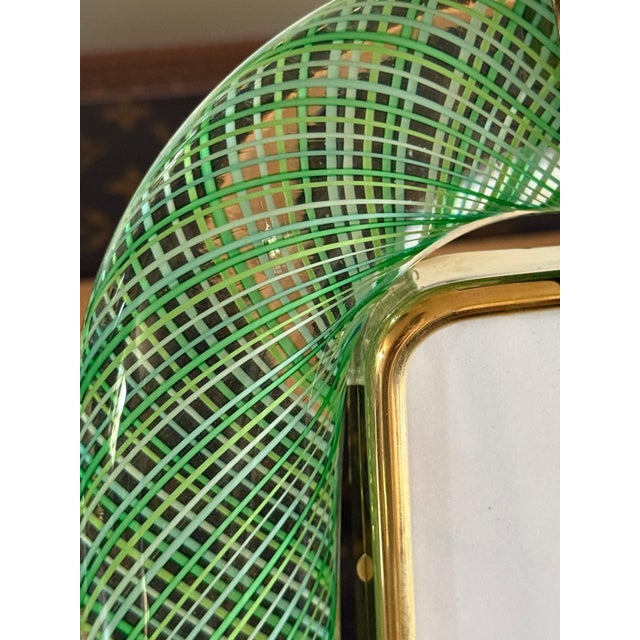 This magnificent vertical photo frame is purely in keeping with the tradition of Venetian glassmaking. The technique used...