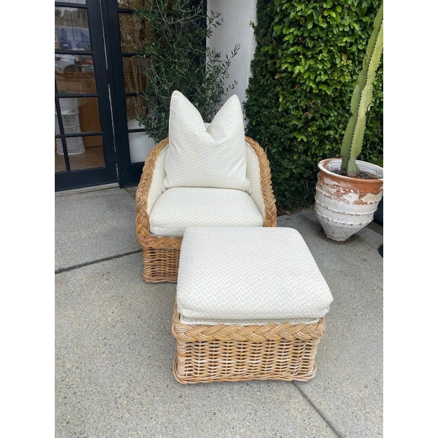 The coziest occasional chair with matching ottoman! We reupholstered this vintage wicker chair and ottoman with this great...