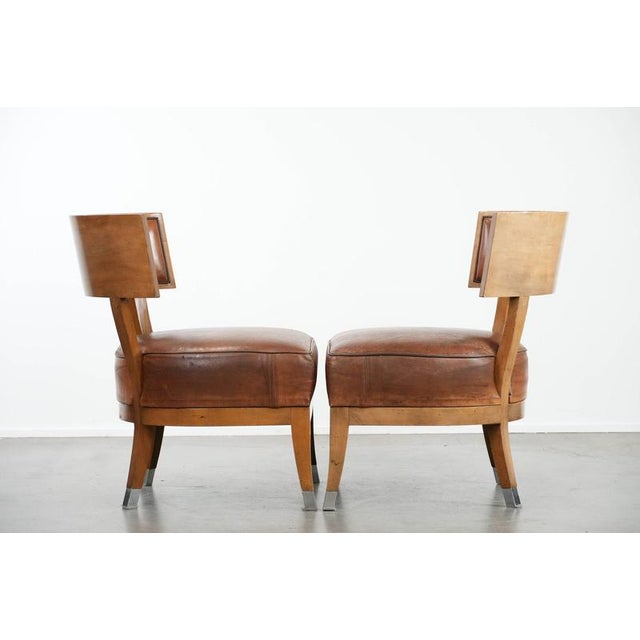 ByThijs: this stunning set of two vintage designer cocktail chairs/armchairs made of sheepskin leather with a unique...
