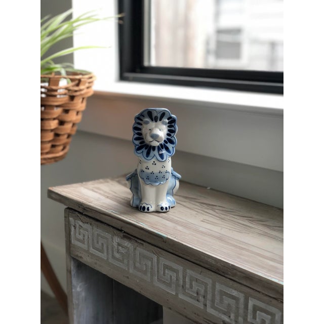 This vintage king of the jungle will rule your brunch table or tea party. The blue and white detail on this Russian piece...