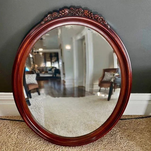 An absolutely beautiful Kindel Oxford mahogany oval mirror suitable to hang as a pier, console, or fireplace mantel. The...