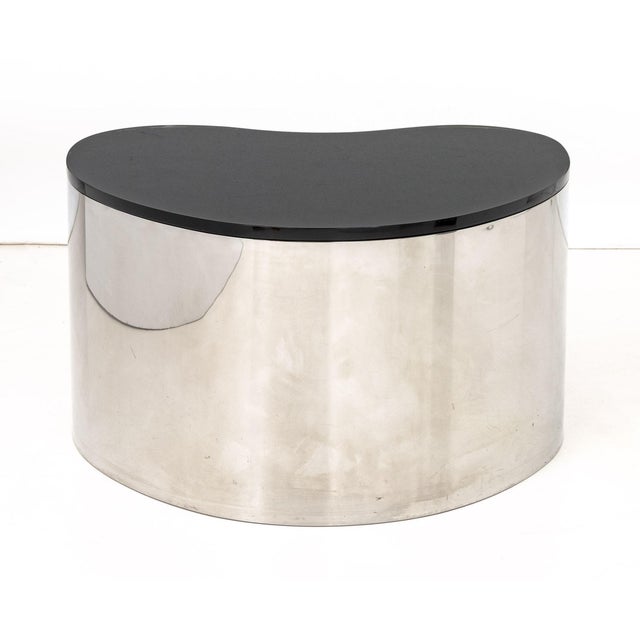 Karl Springer Stainless Steel and Black Glass Freeform Coffee Table, circa 1970. 18.5" H x 31.75" W x 26" D. Provenance:...