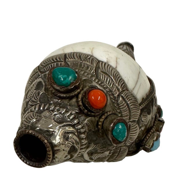 Tibetan ritual conch shell trumpet, also known as a "Dungkar" in Tibetan Buddhism or "Shankha" in Sanskrit. These...