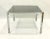 Mid-Century Chrome and Smoked Glass Coffee Table, 1980s, in Very Good conditions. Designed 1980 to 1989
