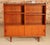 Mid Century teak bookcase, circa 1960s. 2 adjustable shelves and 2 cabinets with sliding doors. Excellent restored...