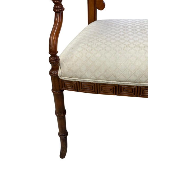 Chair With Greek Key Design and Bamboo Legs This exquisite Vintage Regency Chair showcases a striking Greek key design...