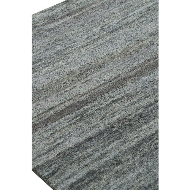 Hand-knotted in silk, this 9x12 rug is a rich new addition to Rug & Kilim’s Textural rug collection—with an impressive...